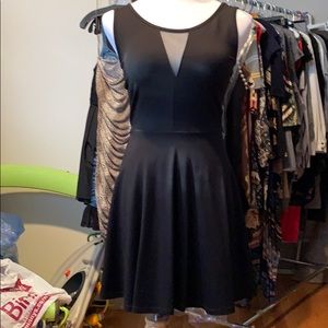 Solid black dress with mesh cutouts